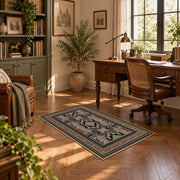 Gray and brown Southwestern area rug with black tribal geometric motifs, complete product view