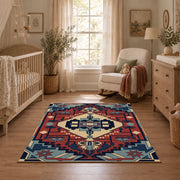 Blue and red tribal medallion area rug with cream and teal accents, full pattern view