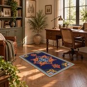 Navy and orange tribal area rug with red and cream geometric details, complete product view