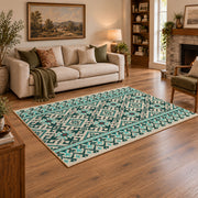 Mint and black geometric area rug with an allover modern tribal pattern, angled room view