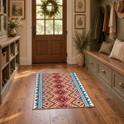 Red and cream diamond area rug with blue and black Southwestern details, front room mockup