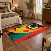 Colorful vintage geometric abstract portrait area rug displayed beside a cozy bed