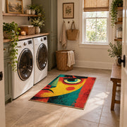 Colorful vintage geometric abstract portrait area rug placed in a modern laundry room