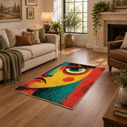 Colorful vintage geometric abstract portrait area rug shown beside a comfortable sofa