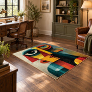 Colorful vintage geometric cubist portrait area rug angled view in a classic bedroom