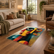 Colorful vintage geometric cubist portrait area rug shown beside a comfortable sofa