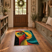 Colorful vintage geometric woman portrait area rug displayed in a refined hallway