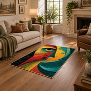 Colorful vintage geometric woman portrait area rug shown beside a comfortable sofa