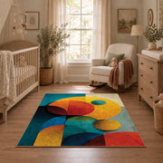 Colorful vintage geometric geometric forms area rug shown in a calm nursery