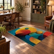 Colorful vintage geometric geometric forms area rug angled view in a classic bedroom