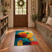 Colorful vintage geometric geometric forms area rug displayed in a refined hallway
