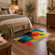 Colorful vintage geometric geometric forms area rug styled in a restful bedroom