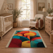 Colorful vintage geometric botanical area rug shown in a calm nursery
