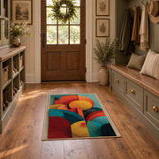 Colorful vintage geometric botanical area rug displayed in a refined hallway