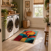 Colorful vintage geometric botanical area rug placed in a modern laundry room