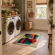 Colorful vintage geometric figurative art area rug placed in a modern laundry room