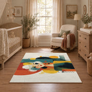 Colorful vintage geometric family portrait area rug shown in a calm nursery
