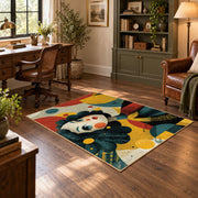 Colorful vintage geometric floral portrait area rug angled view in a classic bedroom