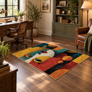 Colorful vintage geometric child portrait area rug angled view in a classic bedroom