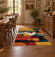 Colorful vintage geometric child portrait area rug shown in a bright dining space