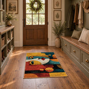 Colorful vintage geometric child portrait area rug displayed in a refined hallway
