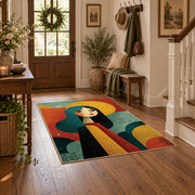 Colorful vintage geometric woman silhouette area rug styled in a welcoming entryway
