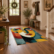 Colorful vintage geometric couple portrait area rug styled in a welcoming entryway