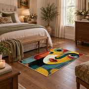 Colorful vintage geometric couple portrait area rug styled in a restful bedroom