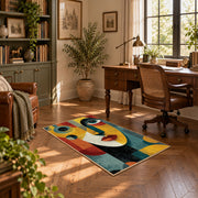 Colorful vintage geometric couple portrait area rug displayed in a sunlit home office