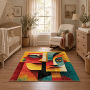 Colorful vintage geometric twin faces area rug shown in a calm nursery