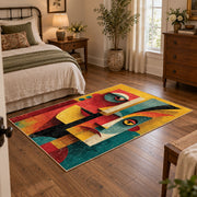 Colorful vintage geometric twin faces area rug displayed beside a cozy bed