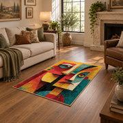 Colorful vintage geometric twin faces area rug shown beside a comfortable sofa