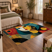 Colorful vintage geometric child portrait area rug displayed beside a cozy bed