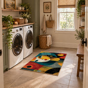 Colorful vintage geometric child portrait area rug placed in a modern laundry room