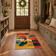Colorful vintage geometric girl portrait area rug displayed in a refined hallway