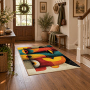 Colorful vintage geometric fruit still life area rug styled in a welcoming entryway