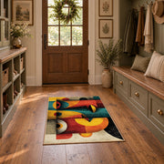 Colorful vintage geometric fruit still life area rug displayed in a refined hallway