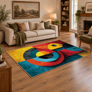 Colorful vintage geometric cubist face area rug styled in a warm living room