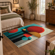 Colorful vintage geometric tree art area rug displayed beside a cozy bed