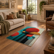 Colorful vintage geometric tree art area rug shown beside a comfortable sofa