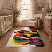 Colorful vintage geometric retro floral area rug shown in a calm nursery