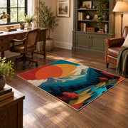 Colorful vintage geometric mountain landscape area rug angled view in a classic bedroom
