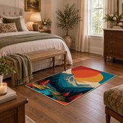 Colorful vintage geometric mountain landscape area rug styled in a restful bedroom
