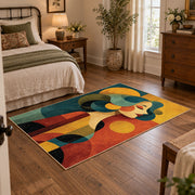 Colorful vintage geometric family portrait area rug displayed beside a cozy bed