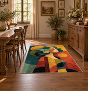 Colorful vintage geometric family portrait area rug shown in a bright dining space