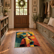 Colorful vintage geometric family portrait area rug displayed in a refined hallway