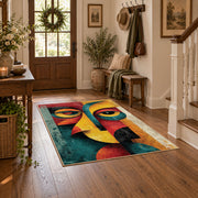 Colorful vintage geometric cubist face area rug styled in a welcoming entryway