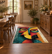 Colorful vintage geometric cubist face area rug shown in a bright dining space