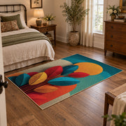 Colorful vintage geometric autumn leaves area rug displayed beside a cozy bed