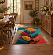 Colorful vintage geometric autumn leaves area rug shown in a bright dining space